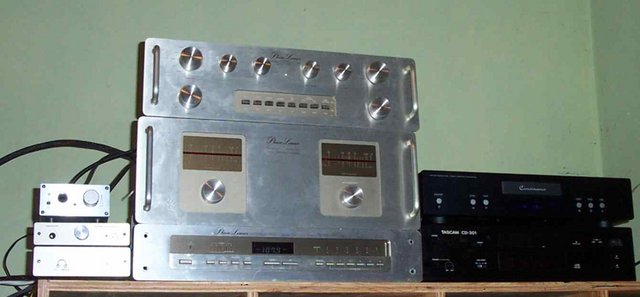 stereo system - Phase linear amp pre and tuner, Gilmore lite and Head five headphon amps, Consonance and tascam cdp