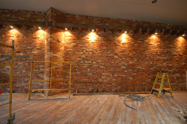 Listening area after drywall - Maple floors installed, brick surfaced and sealed, drywall hung and taped, electrical installed and a few lights hooked up. Still a ways to go but light at the end of the tunnel!