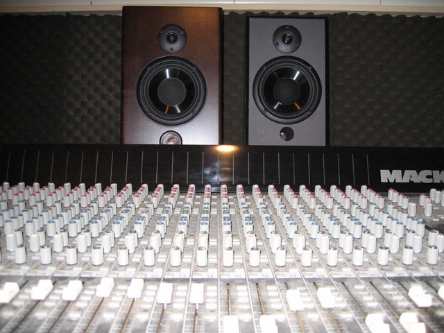 Tannoy nearfield monitors - Custom cabinet mod done to Tannoy monitor ( original on right ). Pictured during A/B testing. Original cab, 9 lbs, particle board/MDF. Modified version 32lbs, 1 1/2" thick MDF sides, back and baffle, top and bottom 2 1/4" thick MDF, Anegre veneer, custom tinted NGR dye.