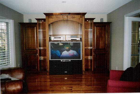 Custom A/V wall unit - Example of our custom work, Maple in brown cherry.