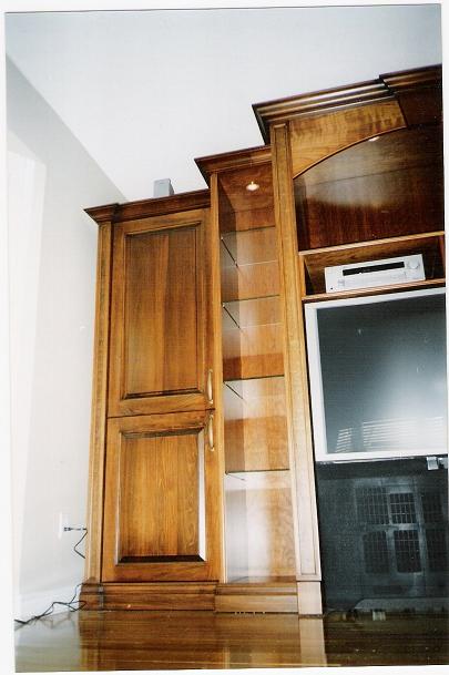 Custom A/V wall unit - Example of our custom work. Maple in brown cherry.