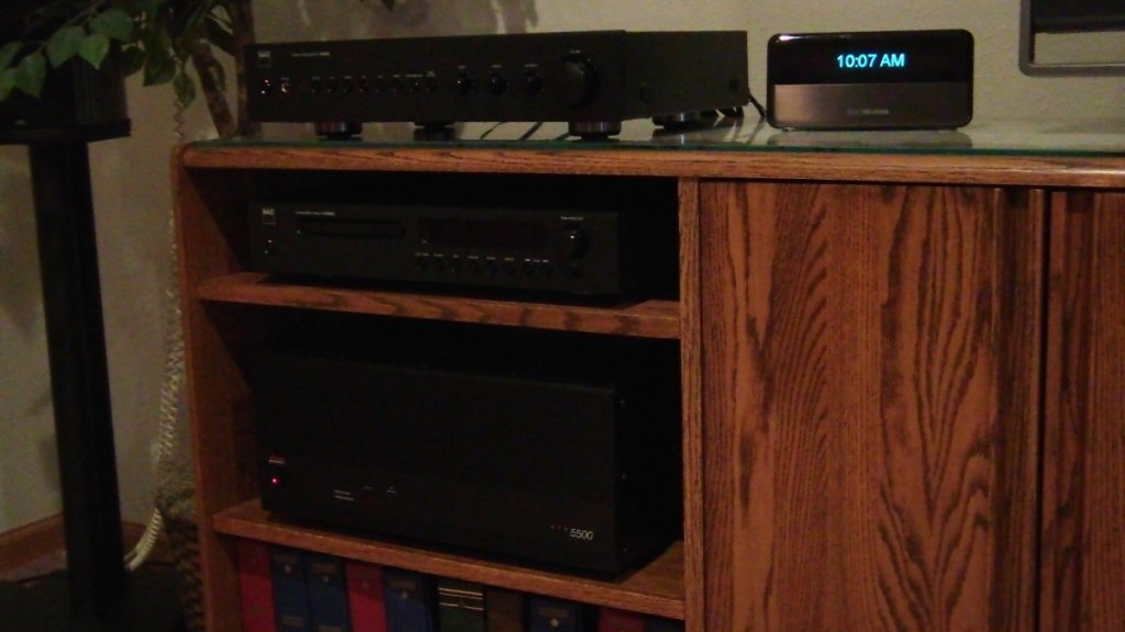 Another angle on the core stack, with my trusty slim Devices Squeezebox Classic visible to the right or the pre. Behind the cabinet doors on the right resides a CD recorder, a cassetted deck, a turntable and the Bose 901 EQ.