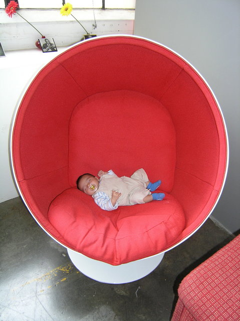 Hanging out in the Big Ball Chair - Kai's just relaxin' ... looks like he's on a giant tongue in a toothless mouth.