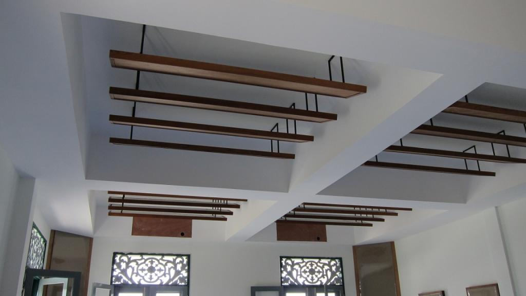 Ceiling with wooden slats installed.