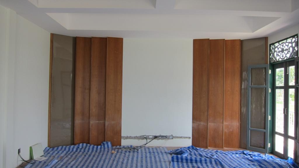 Front wall diffusors and corner bass traps.