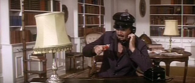 Merde, the glue, oh nuuh! - Peter Sellers trying to fix a phone...
With glue.. Insane!!!
He's just discovered that he's sitting on the 
glue and is stuck...