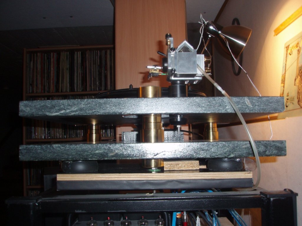 A very heavy soapstone plinth on delrin/sorbothane shock absorbers