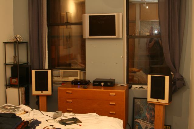 system settling in unsettled bedroom - signature 30 from red wine audio and omega super 3 and paradisea DAc and home made stands. we just renovate dthis 10 x12' room so there are a lot of loose ends and not a lot of space. thats the bed in the foreground.