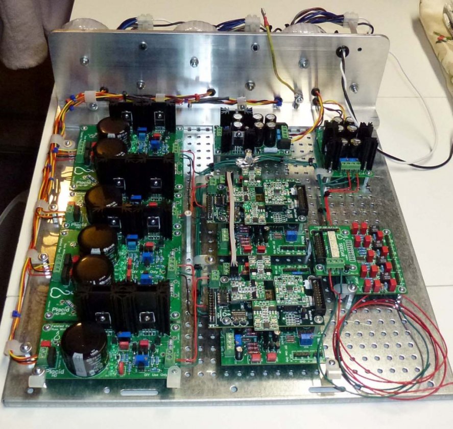 One thing Twisted Pear does is use four regulators for different portions of the DAC. Shunting power supplies are used to power each DAC board and right and left channels of output board. Lots of heat but such good sound! Two small power supplies power the Arduino/LCD screen and USB/input switching boards.