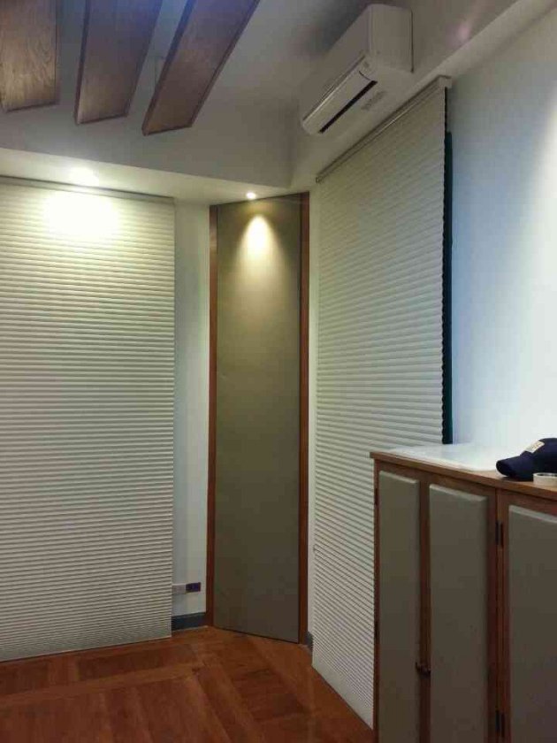 Shades at the back of the room.