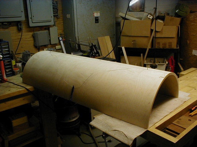 Two loci and a length of wire describe the elipse. Plywood 1/2 cylinders were sourced on Long Island.