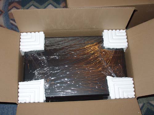 Inside the inner box - Excellent packaging. Styrofoam corners fit perfectly, the box has nowhere to move.