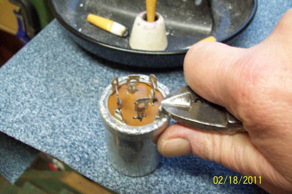 Crimping of the can... can be hot-glued in place (you must move fast to glue properly.. cools damn fast!!)