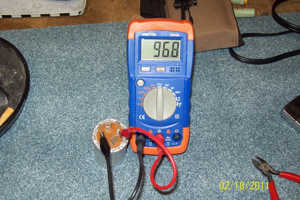 Checking the capacitance. Note where the POSITIVE probe is connected to.