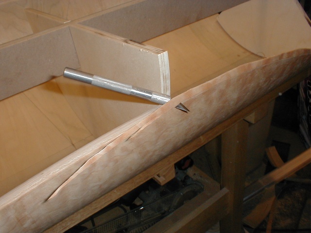 Edge trimming. Maple veneer is very brittle and prone to tearing.