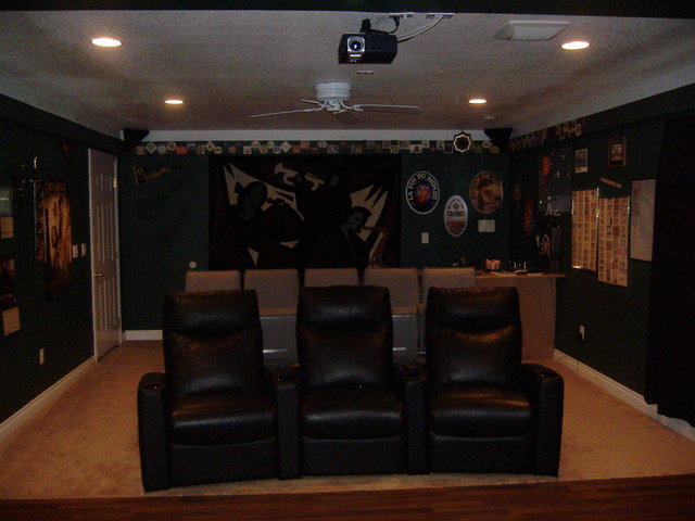 Soundroom - Rear of room showing the 2 rows of seating, wet bar in rear right, all my concert tickets on right wall in frames, beer memorabilia above wet bar.