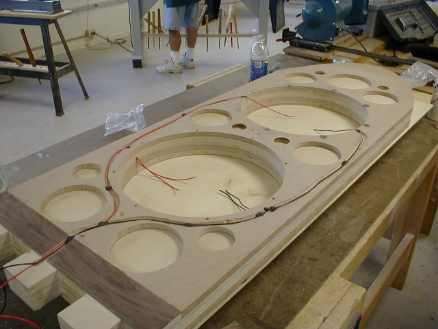Baffle gets routed for internal wiring. Veneer at bottom is scrap to compensate for US 1/2 inch (MDF) and EU 1/2 inch (plywood extentions).