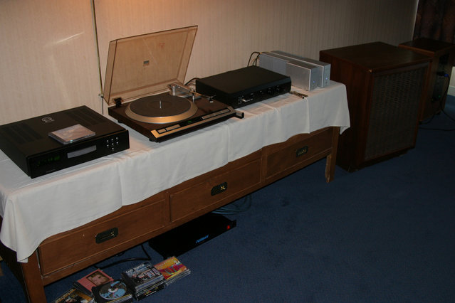 AK Member Room - DocBrown - $25 thirft shop rescued Eectrovoice SP12 speakers, Red Rose monos, Primare CD player, Amherst preamp (passive mode) and a REL Storm III.

And the Denon turtable? $17 at the thrift store! The automatic functions don't always works ... but for that price who cares.
