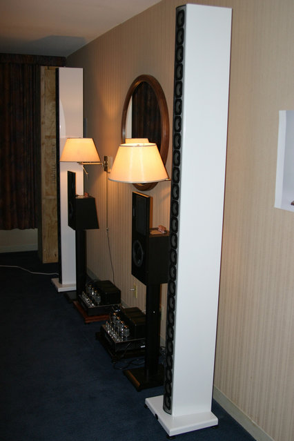 IDS Room - The IDS line arrays with 25 full-range drivers per side ... at nearly $20,000 a pair, that's almost $400 per driver. Sounds more affordable when you put it that way.

Mc Intosh amps and front end. The Eminent Tech speakers seemed to only be on display.