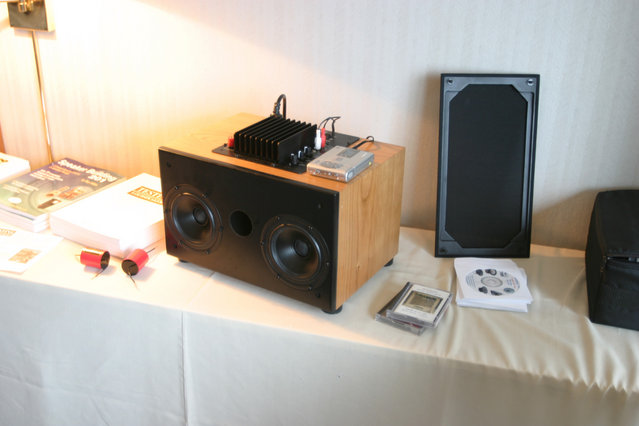 Madisound Room - Prototype table-top stereo kit with a Kiega 2.1 channel amp, 7" bottom firing sub and dual SEAS coaxial speakers for left and right channels. Sounded great with an minidisc player should only cost around $500 cabinet included.