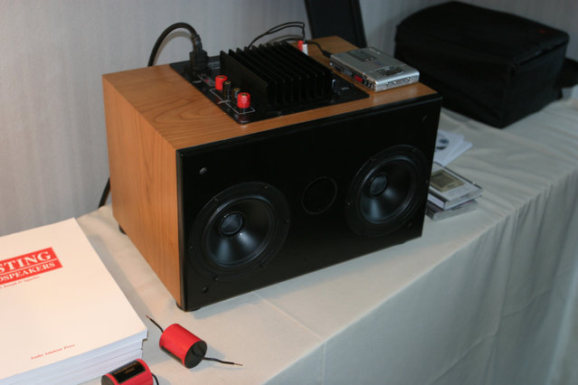 Madisound Room - Prototype table-top stereo kit with a Kiega 2.1 channel amp, 7" bottom firing sub and dual SEAS coaxial speakers for left and right channels. Sounded great with an minidisc player should only cost around $500 cabinet included.