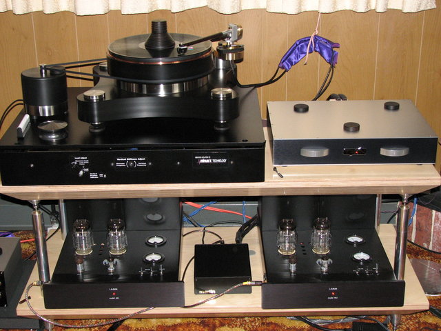 My stuff - TW Acustic Raven AC turntable with a Schroder DPS arm and a Miyabi 47 cart on a Minus K Technology platfrom.

Tron Syren preamp with phono to Lamm ML1 mono's to Merlin VSM SE speakers.