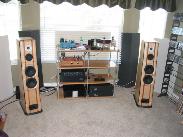 System as of 4/15/2007 - SB2 -> Marchand XM-44 Active XO -> R.E. Designs LNPA 150 amp (mids/highs), Rotel 1080 (bass) -> Meadowlark Blue Heron 2 rewired for active XO. 

Analog: Teres w/Scheu-Benz cartridge -> Hagerman Cornet w/Jensen step up trans -> DIY version of de Havilland Ultra Verve (not an exact copy). 

IC's are DIY twisted pair with shield tied to earth via LP filter. 
Power cords are DIY of VH Audio type IV and Volex. 
Speaker cables are Analysis Plus Oval 9 for mid/high and DIY star-quad w/4 12GA for woofers. 
Room treatments are GIK Acoustics.