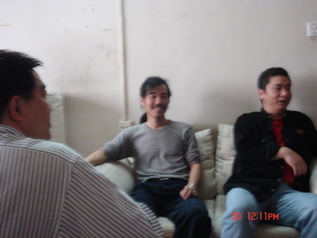 Chinese listening session!!! - Aren and one of his friends as we were just sitting around listening to music. This friend of "Aren" has one of the best sounding systems in mainland China. He converted a rooftop room/area at his apartment building into his own "paradise". Including security gates and a "guard dog" to keep "intruders" away.