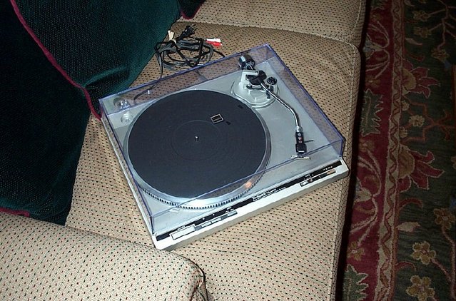Technics SL-Q303 - Craigslist item for $35. Pitted, milky white cover was transformed by use of Janvil plastic polish and cleaner. Fitted with longhorned and damped Grado green. Unbeatable for $95.